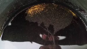 gold in black sand